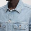 Den tvättade jeansjackan Den tvättade jeansjackan